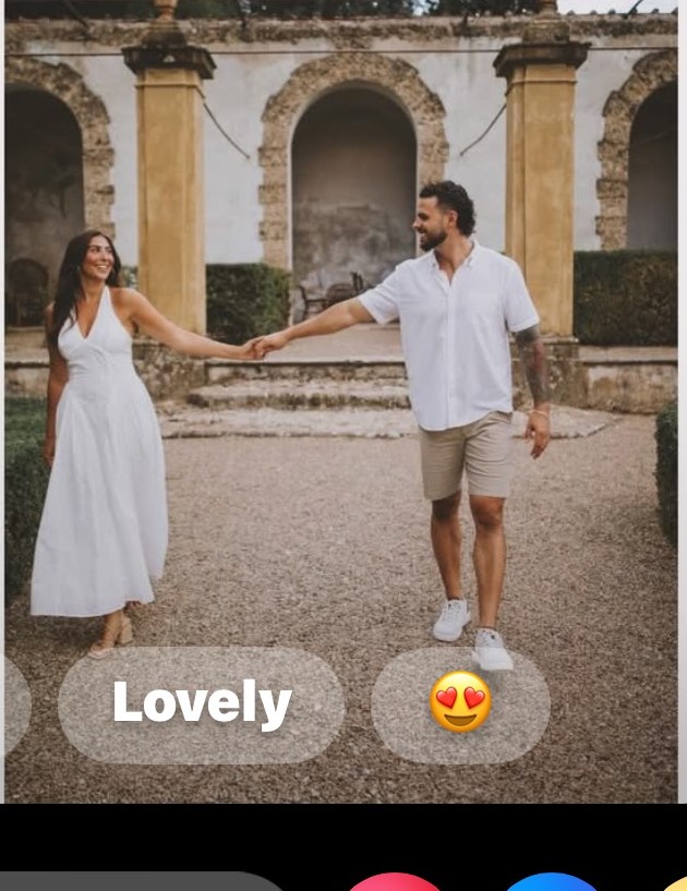 Holding hands in a courtyard